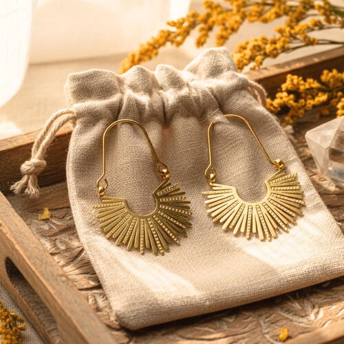 Boucles d'oreilles dorées en forme de soleil