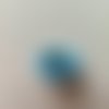 Petite fleur artificielle en tissu 30mm bleu