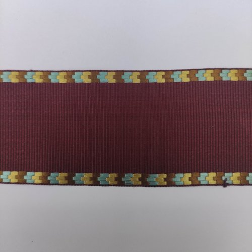 1 metre de ruban  polyester bordeaux lisière motif bleu et or 45mm