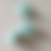 Lot de 3 fleurs artificielles en tissu vert pastel sur tige