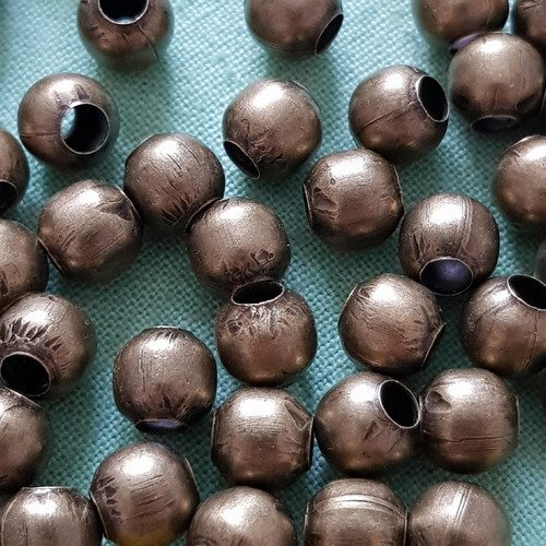 Lot de 10 perles métal coloris bronze antique 6mm.