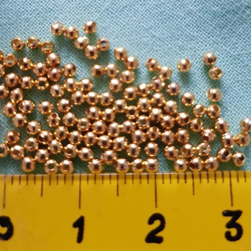 Lot de 300 perles à écraser dorées 2mm.