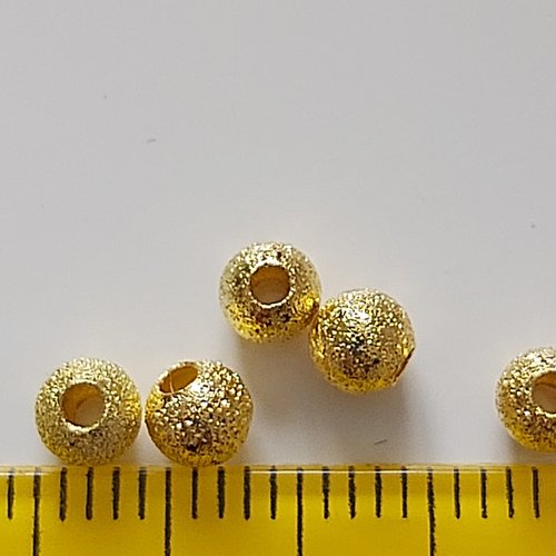 Lot de 10 perles dorées effet givré 4mm.