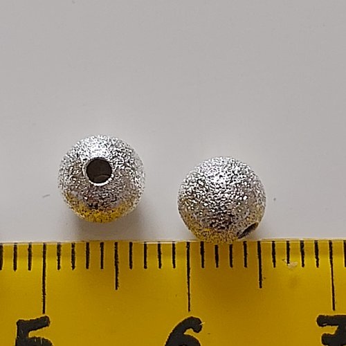 Lot de 10 perles effet givré argentées 6mm.