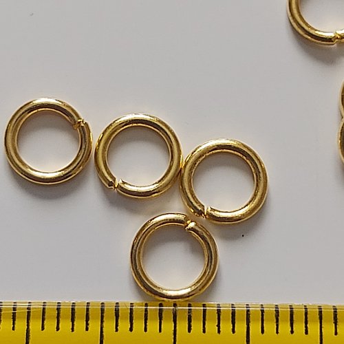 Lot de 100 anneaux dorés 6mm.