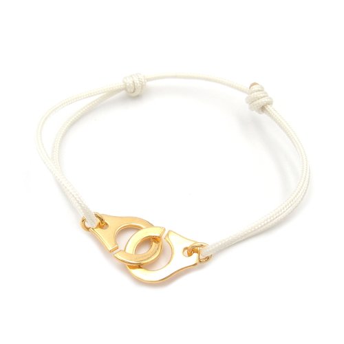 Bracelet menotte doré et cordon crème