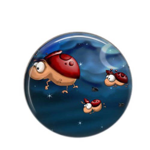 Cabochon rond résine 25mm crazy world 15 