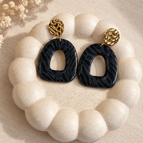 Boucles d'oreilles ovale zébré noir