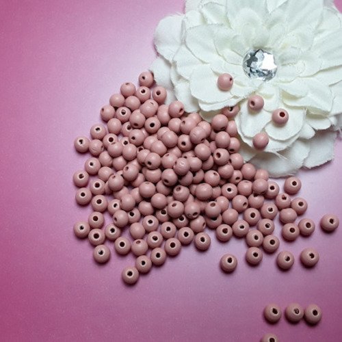 Perle en bois rose chair de 8x7mm trou de 2mm par lot de 40