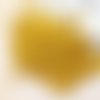 Perle en bois jaune ronde de 4.5x3mm trou de 1.4mm par lot de 100