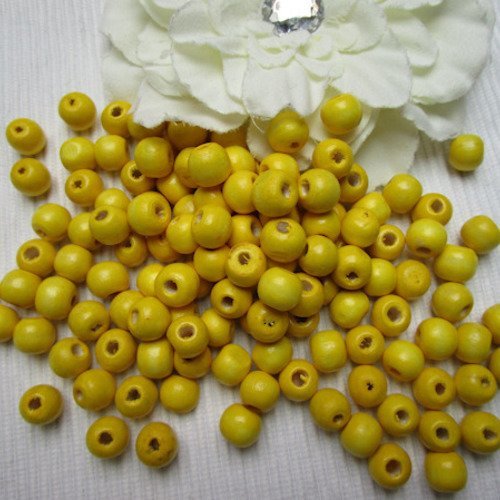 Lot de 15 perles de 10x9mm bois jaune trou de 3mm