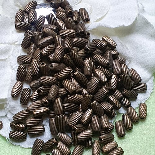 Lot de 10 perles tubes ciselés 7x3.5mm bronze