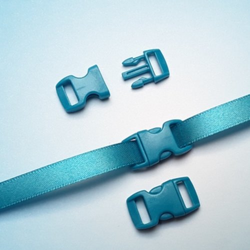 1 fermoir à clip bleu turquoise 28x15mm plastique rigide