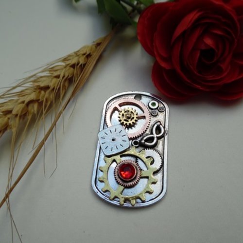 1 pendentif engrenage plaque strass 6x3.5cm 