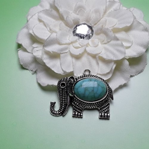 1 pendentif éléphant ciselé 4.8x3.8cm turquoise argent tibétain 