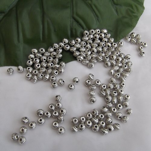 Lot de 12 perles citrouille 5x4.2mm argent tibétain
