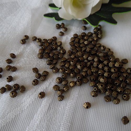 Lot de 10 perles toupies striées 5x3.5mm bronze