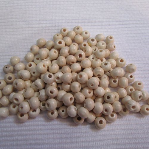 20 perles ivoire ronde 7.5x6mm en bois