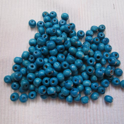 20 perles bleue ronde 7.5x6mm en bois