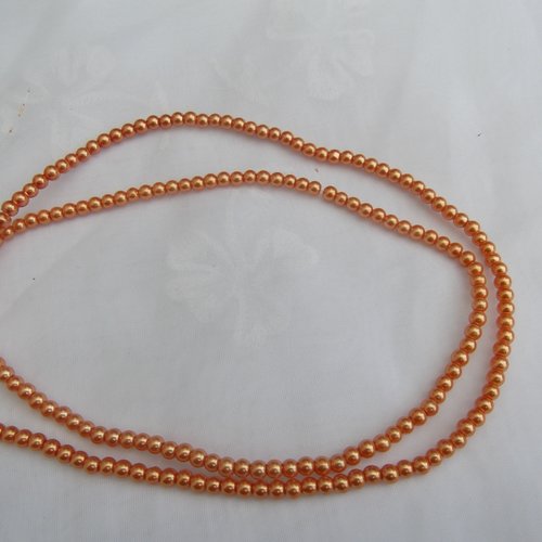 25 perles orange vif ronde 4.6x4mm en verre