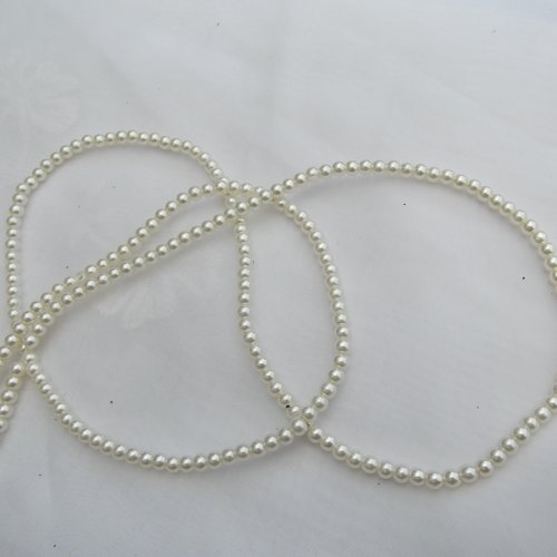 25 perles ivoire ronde 4.6x4mm en verre