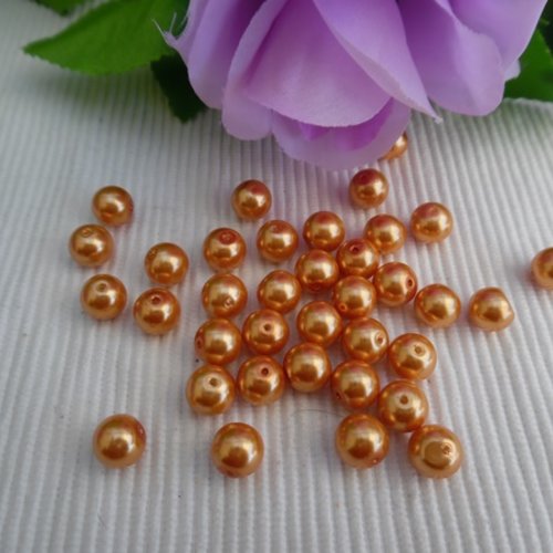 6 perles orange doré ronde 10x9mm en verre.