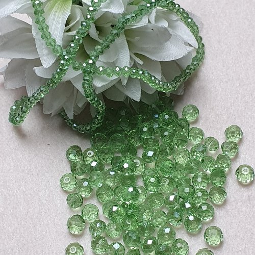 35 perles vert à reflet 7.5x6mm à facette ronde plate cristal