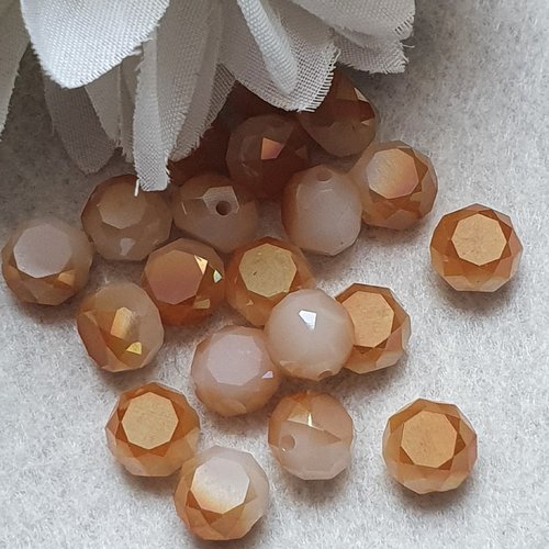 2 perles cristal ambre blanc 10x7mm à facette ronde plate. trou de 1.4mm