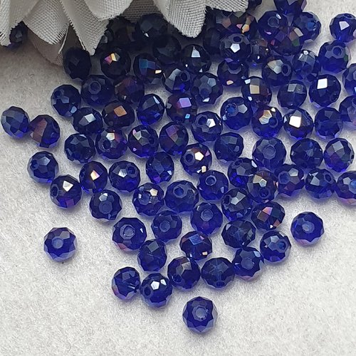 45 perles cristal bleu nuit reflet 5.5x4.5mm à facette ronde.trou de 1.4mm