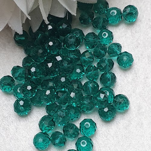 35 perles cristal vert 7.5x6mm à facette ronde.trou de 0.8mm