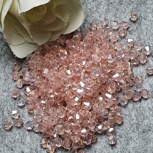 50 perles cristal rose reflet ab 4.5x4mm à facette toupie.trou de 0.6mm