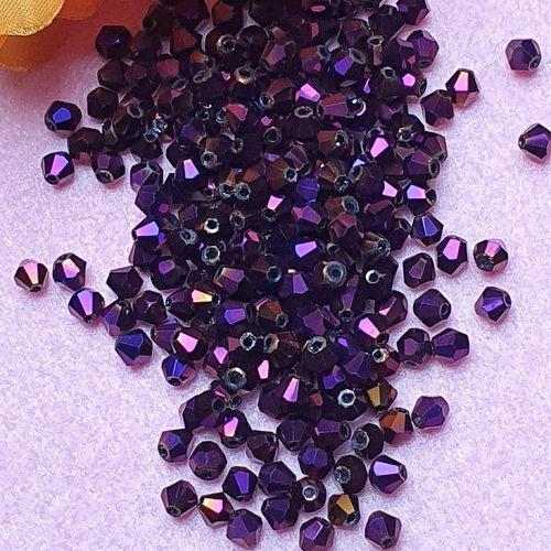 70 perles toupie violet à reflet 4x4.4mm cristal à facette