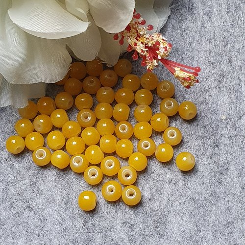 10 perles jade jaune 6x5mm trou de 0.8mm. n°2