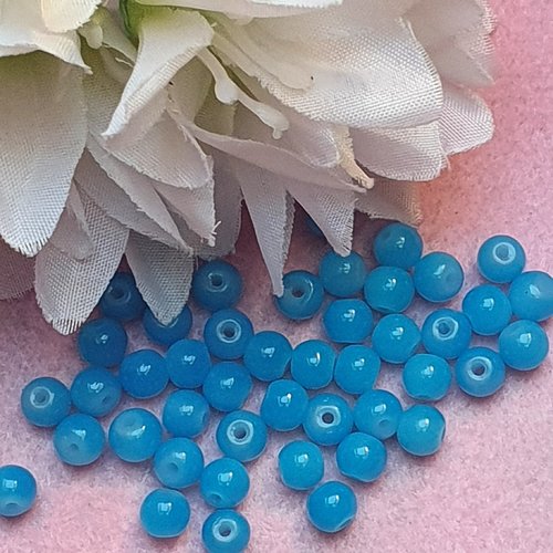 10 perles jade ton bleu 6x5mm trou de 0.8mm. n°43