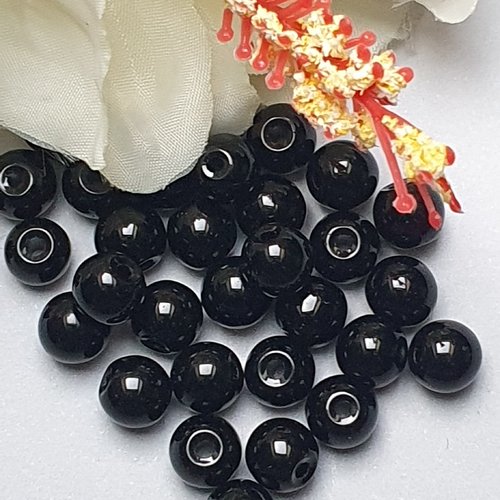 10 perles jade ton noir 8.5x7.5mm trou de 1.5mm. n°61