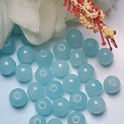 10 perles jade ton bleu ciel 8x7.5mm trou de 1.5mm. n°64