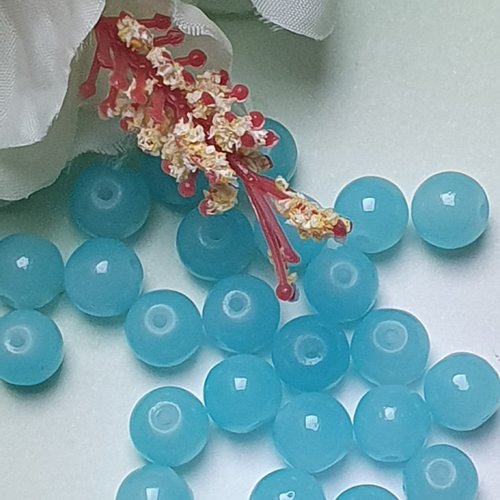 10 perles jade ton bleu 8x7.5mm trou de 1.5mm. n°66