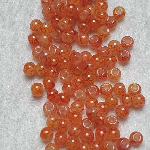 50 perles jade ton orange marbré 4.5x4mm trou de 0.7mm. n°91
