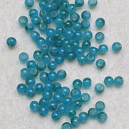 50 perles jade ton bleu vert 4.5x4mm trou de 0.7mm. n°92