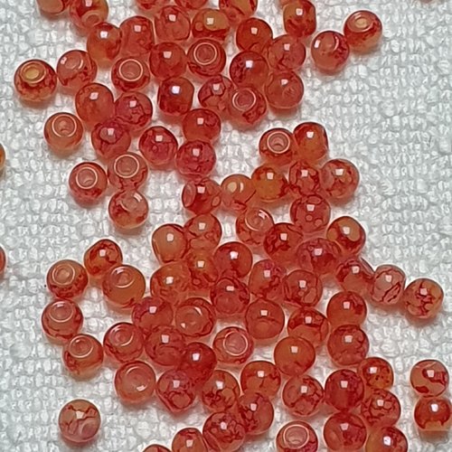 50 perles jade ton orange marbré 4.5x4mm trou de 0.7mm. n°112