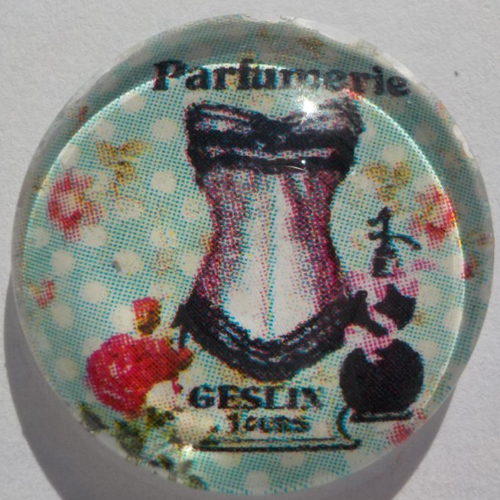 Cabochon de verre en 25 mm, avec son image de buste de femme