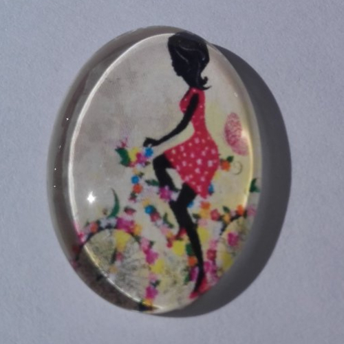 Cabochon de verre, jeune femme,vélo, ovale, 25 x 18 mm