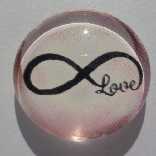 Cabochon de verre avec son image signe de l'infini rose, 25 mm, verre
