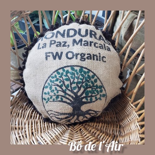 Coussin rond toile de jute "arbre acajou du honduras" , galon pompon