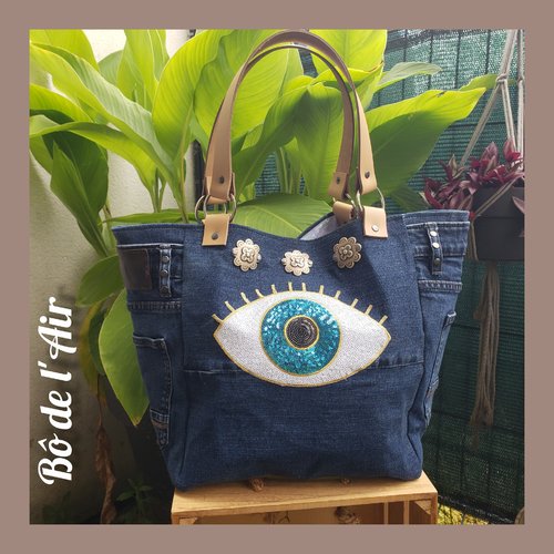 Sac cabas toile de jean revalorisée,  grand œil sequins, fleurs métal argenté
