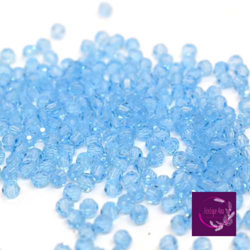 Perles en verre bleu glacier argenté toupie 2 mm - 12 gr