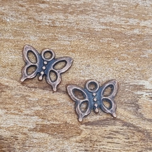 Breloque papillon ton cuivré en métal x 2