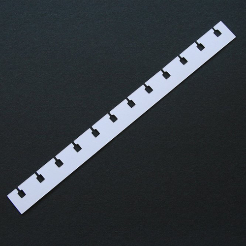 Découpe en papier - frise cahier à spirale - blanc - 20 x 1,7 cm