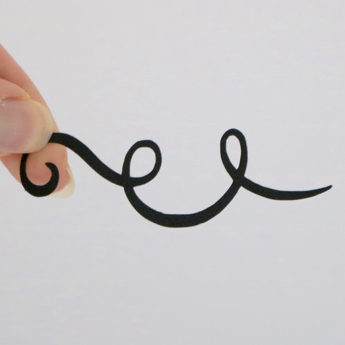 Découpe en papier - volute - noir - 7,5 x 3,4 cm