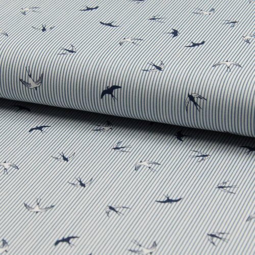 Tissu habillement - 100% coton - rayures blanches et bleu avec motif hirondelle.